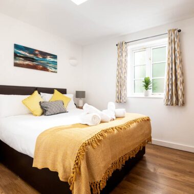 Sampson bedroom 2 with zip and link king bed